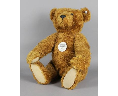 A Steiff mohair bear - 'Teddy bear 1906", 70cm long, No. 1537, with certificate and box Good condition, although some damage 