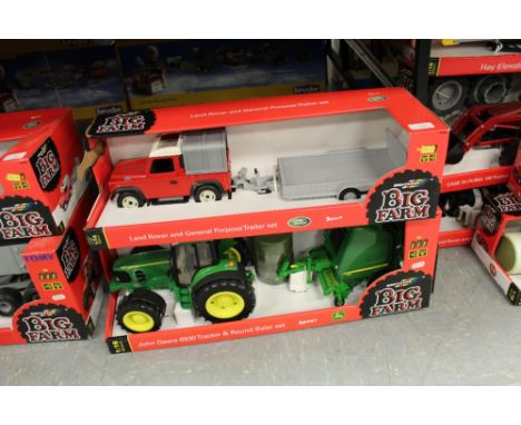 Britains JD tractor, round baler set with land rover and trailer set