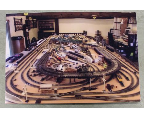 An extensive 00 gauge model railway layout composed of predominantly Hornby but also some Bachmann rolling stock, with detail