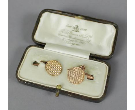 A pair of 9ct gold cufflinks, the engine turned circular faces 1.4cm diameter, Birmingham 1925, weight 4 grams Slight denting