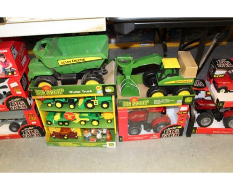 Ertle John Deere plastic toys and Britains case tractor