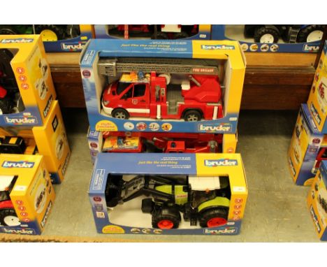 2 Bruder fire trucks and Class tractor