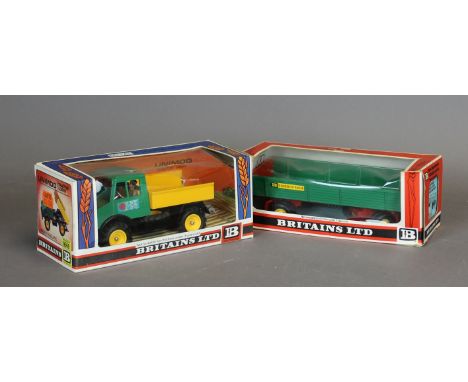 A Britains Unimog Tractor Lorry No. 9569 and a Britains 8 wheeled trailer No. 9558 (both boxed)