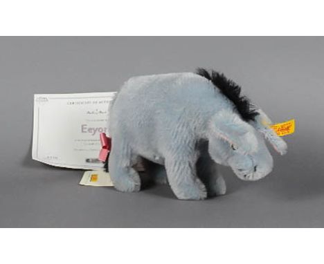 A Steiff blue mohair bear - 'Eeyore', issued by the Danbury Mint, No. 0076, with certificate and dust bag Good condition