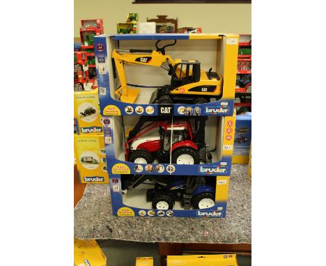 Bruder Steyr tractor, New Holland tractor and CAT digger