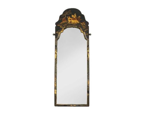 A lacquered and gilt chinoiserie mirror, in the late 18th century taste, the arched top painted with figures at a table, with