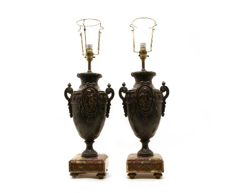 A pair of French bronzed spelter urn table lamps, on marble bases, 42.5cm to top of vaseCondition report: Some repairs to bot