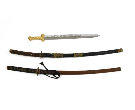 Two 20th century Japanese reproduction katanas, one with a watermarked blade, and a Celtic style reproduction sword by Wilkin
