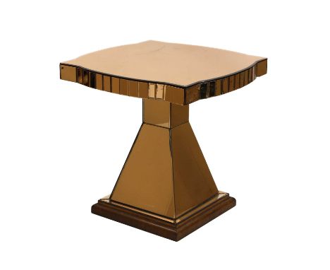 An Art Deco pink tinted lamp table, with a shaped square top, panelled edge, with a tapered stand, on a walnut plinth, 67cm s