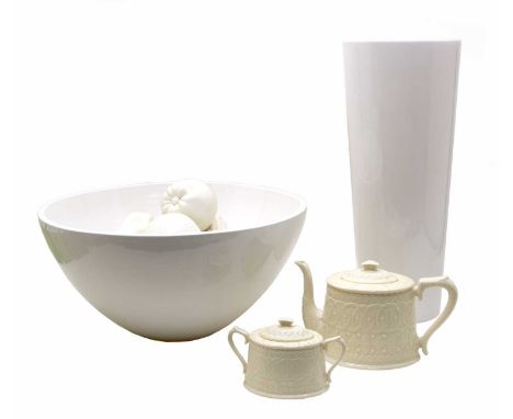 A large plain white ceramic bowl, 40.5cm diameter, a pedestal bowl of eight pieces of china fruit, a Lilly vase, tea pot and 