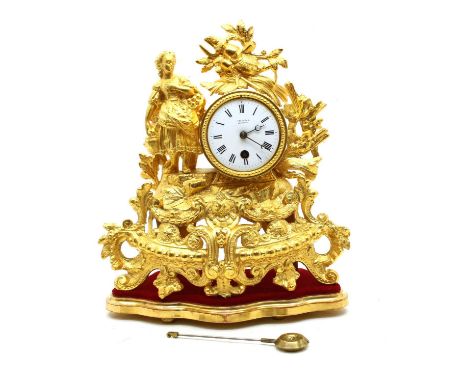A French design gilt spelter mounted clock, with white enamel dial inscribed 'Pearsons Lowestoft' on seperate giltwood stand 