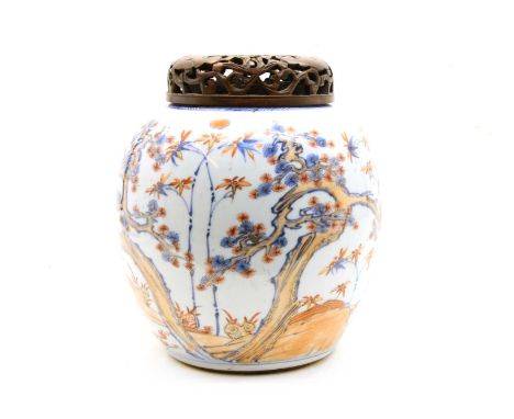 A Chinese porcelain Imari ginger jar, 19th century, in the Kangxi style, painted in underglaze blue, overglaze red and gilt w