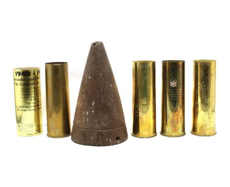 Four modern brass commemorative shellcases and an iron shell cone, the cases variously inscribed for the 1977 Silver Jubilee,