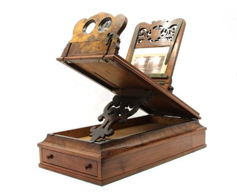 A Victorian burr walnut table top stereoscopic viewer, the table tilting on a ratchetted bracket, with pierced sliding card h