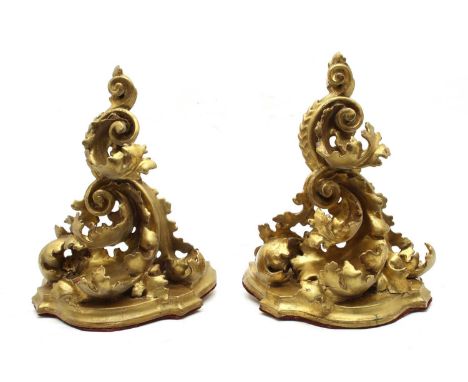 A pair of 19th century giltwood wall brackets, modelled as a cluster of scrolling leaves, 28cm highCondition report: Overpain