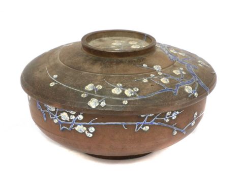 A Chinese Yixing zisha box and cover,Qing dynasty (1644-1911), of circular form on a circular foot, enamelled with blossoming