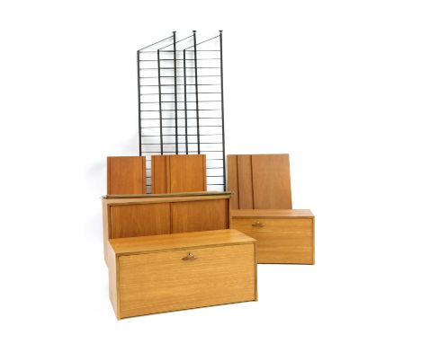 A Ladderax teak wall unit, 1960s, designed by Robert Heal for Staples, comprising a fall front record cupboard, a fall front 