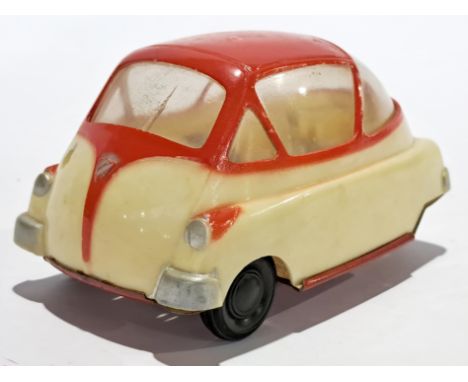Unconfirmed maker, (possibly CH Clim Hermanos). vintage 1957 Isetta friction powered plastic car. Condition generally appears