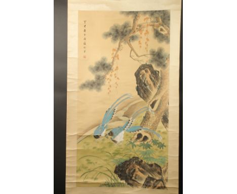 A CHINESE SCROLL PAINTING ON SILK, depicting birds in a woodland setting, inscribed upper left with red seal mark, image 117c