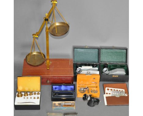 A quantity of jeweler's equipment including balance scales, weights, refractometer, Moe diamond weight gauge, diamond gauges 