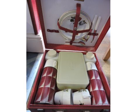 A 1950s Brexton picnic hamper with fitted interior for two