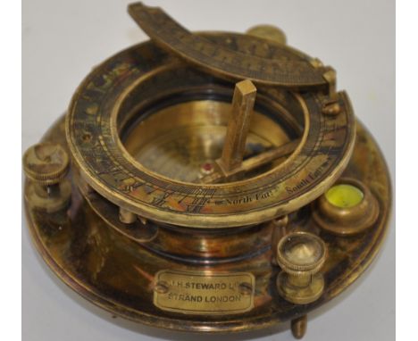 A Victorian style engraved brass compass combined sundial 