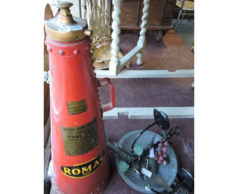 A Romac fire extinguisher, floor standing of red conical form, dated 1969, together with a pair of balance scales and a twin 