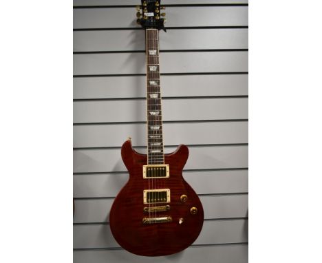 A Gibson Les Paul DC Standard electric guitar , serial number 01231683, having AAA maple top, in Red Hot Tamale translucent r
