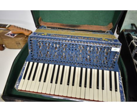 A vintage Toffoli &amp; Fiorani Piano accordion, with case