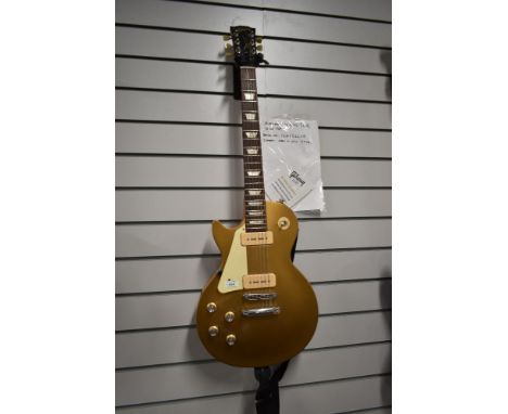 A 2011 Gibson Les Paul Gold Top, P90 pickups, Left Handed, serial number 116411415, in CNB hard shell case, part of the Olly 