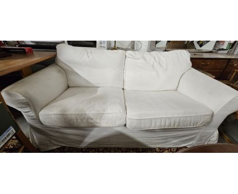 A contemporary two seater sofa in calico upholstery. H.75 W.124 D.80cm. 