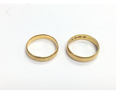 Two 22ct gold bands, approx 6.6g and approx sizes K and K-L.