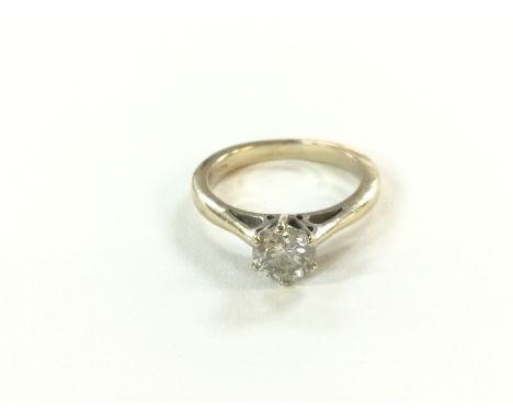 An 18ct gold diamonds ring. Diamond is 0.75. Ring size K and 3.74g.