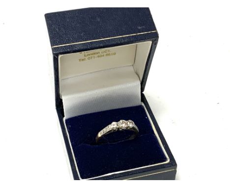 Ann 18ct gold and platinum 3 stone diamond ring, Size O,