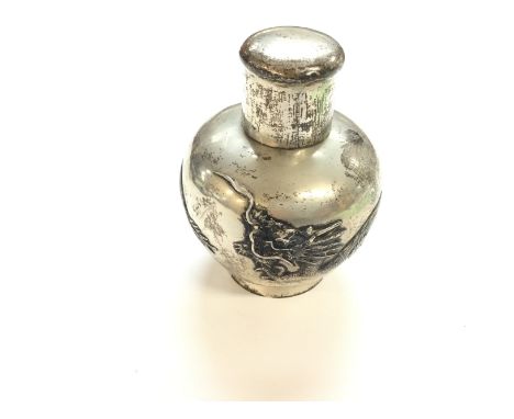 A Chinese tea caddy. 15cm tall and 254g Postage B