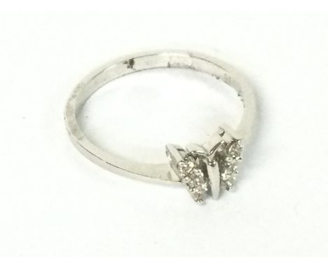 9ct White Gold diamond butterfly ring, 1.66g size M. Class A postage
