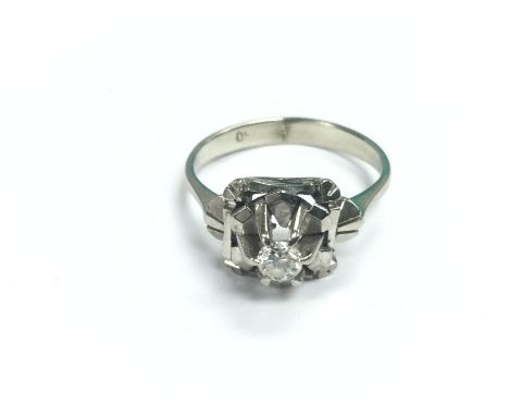 A white gold single stone diamond ring, diamond approx 18 points, approx 4g and approx size K-L. (B10). Shipping category A.