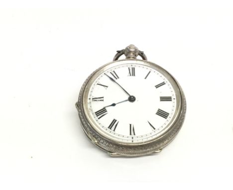 A vintage silver pocket watch. Winds and runs. 40mm case and 52.5g. Postage a.