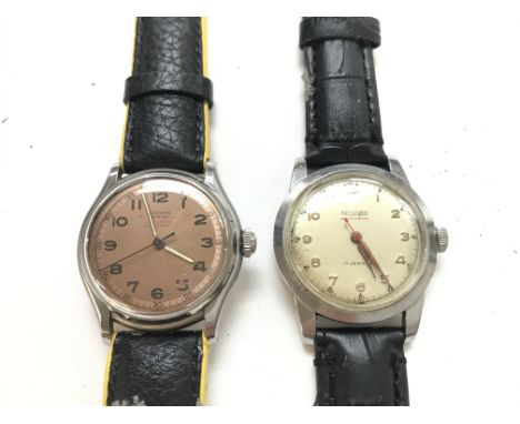 A pair of vintage automatic wristwatches including a Record Geneve and a Richard 17 Jewells.Both wind and run. Postage B