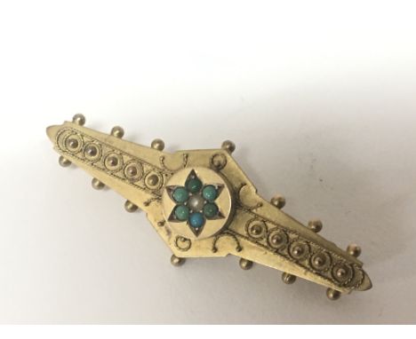 A Vintage 9carat gold brooch set with turquoise and seed pearl. Weight 2g