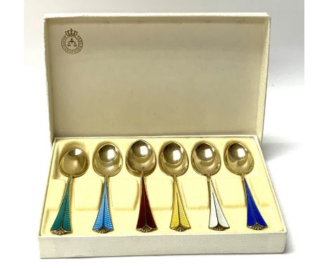 A cased set of six multicouroured enamel David Andersen teaspoons. (A)
