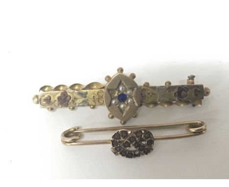 Two Vintage antique brooches set with seed pearl sapphire and garnets pearl missing. Weight 3g