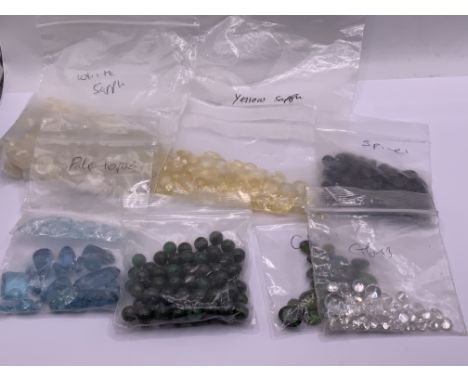 A collection of semi precious stones to include Spinel, Yellow/ white sapphires, Topaz, Jade, CZ