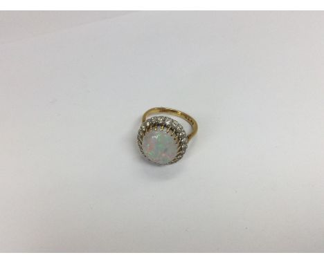 An opal ring approx 6g. Size M (a)