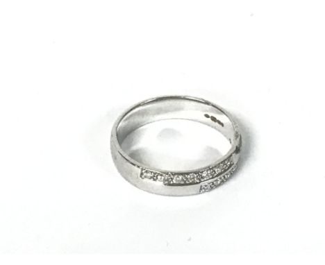 18ct white gold diamond band ring, size N. 3.9g Category A postage
