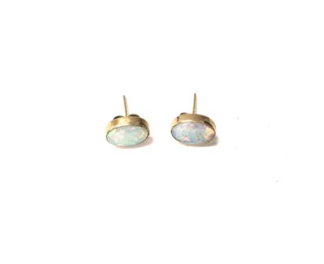 A pair of 9ct gold Opal earrings, approx 1.7 grams. (A)