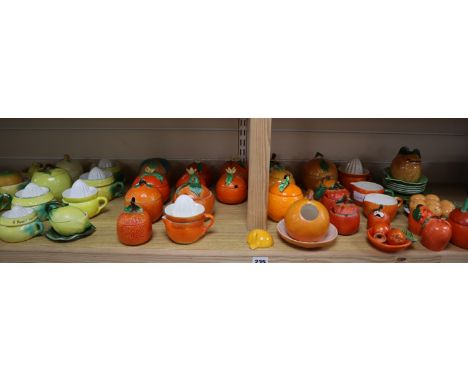 A Victorian pottery marmalade jar and Carltonware jars