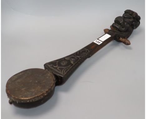 A South East Asian carved wood lute length 65cm