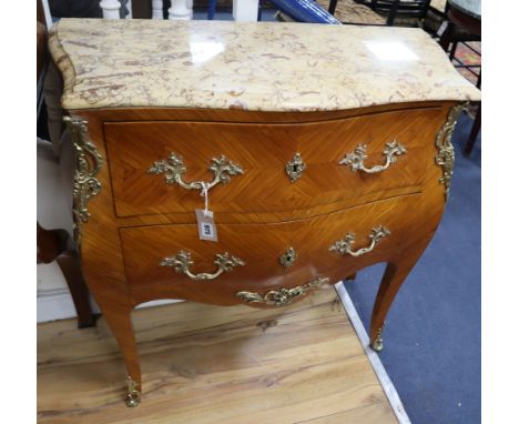 A Louis XVI design marble top bombe commode W.86cm
