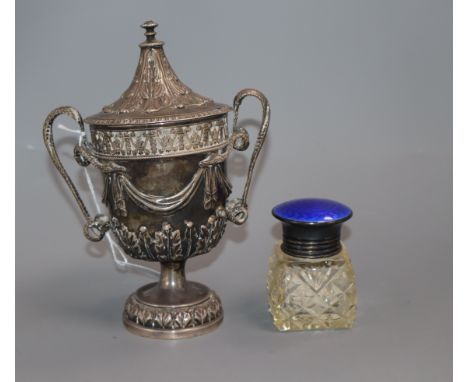 A silver urn and cover, swag and acanthus decoration, London 1935, D &amp; J Welby (a.f.) and a silver and enamel-topped toil